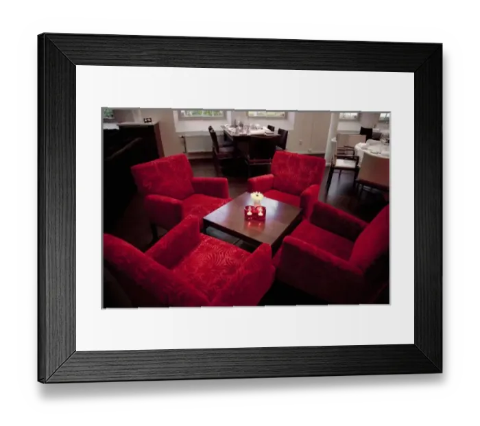 Framed Print : Stockholm, Sweden - High angle view of four red chairs around a small coffee table Framed Print : Stockholm, Sweden - High angle view of four red chairs around a small coffee table