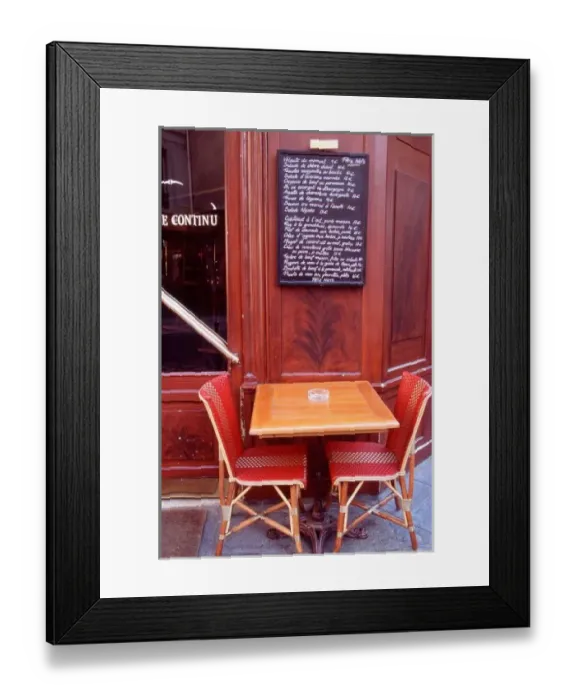 Framed Print : EU, France, Paris. Two chairs in front of a Parisian bistro
