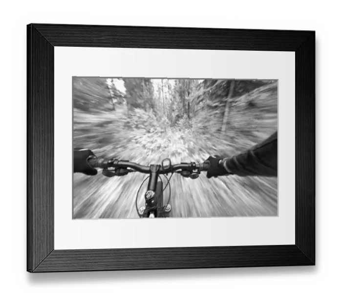 Framed Print : Cruising down a buff section of singletrack trail from the riders perspective near Framed Print : Cruising down a buff section of singletrack trail from the riders perspective near