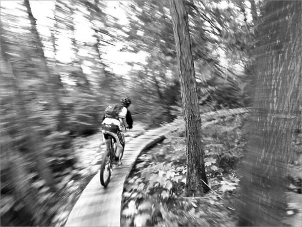 Aaron Rodgers mountain biking on the Stairway to Heaven Trail in Copper Harbor Michigan