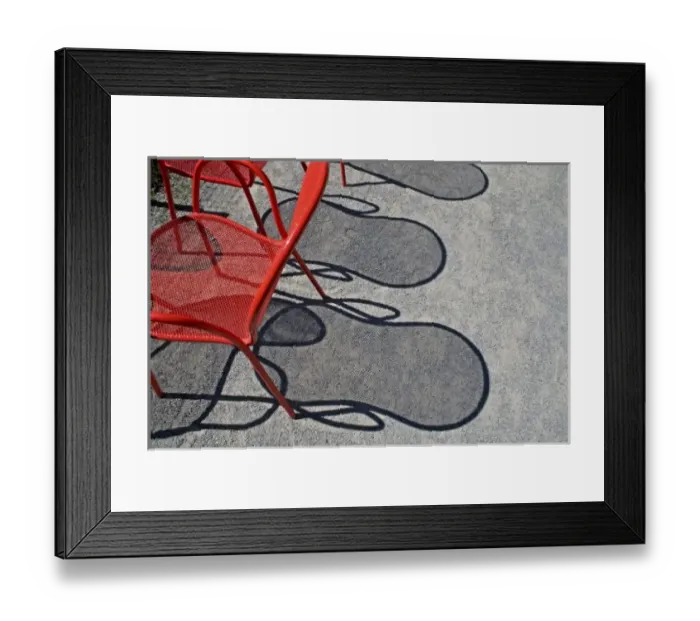 Framed Print : Red wire chairs shadows on concrete Framed Print : Red wire chairs shadows on concrete