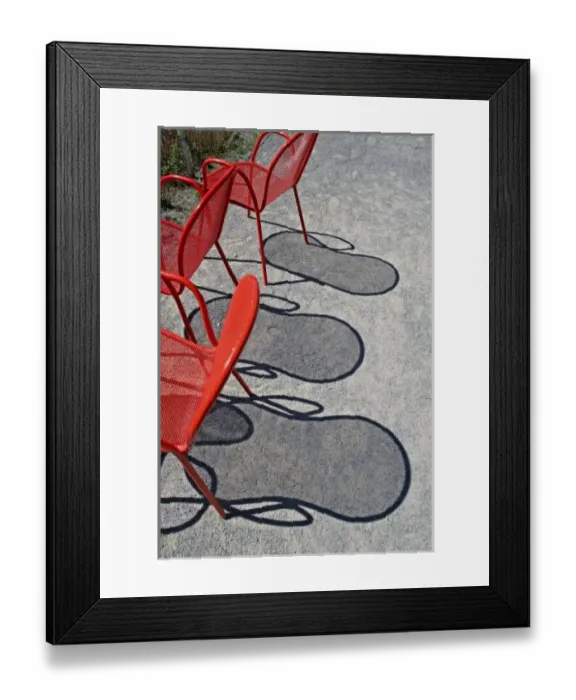 Framed Print : Red wire chairs shadows on concrete Framed Print : Red wire chairs shadows on concrete