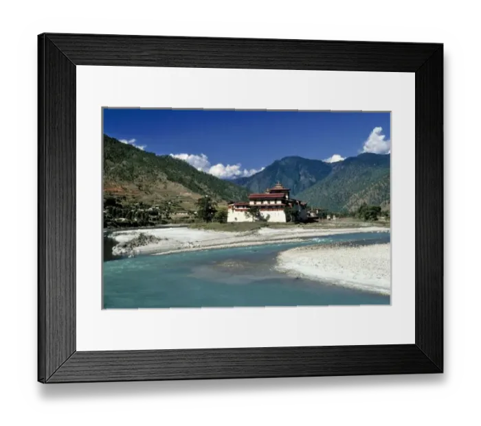 Framed Print : Bhutan, Punaka. The Mo Chhu River flows past Punaka Dzong in Bhutan Framed Print : Bhutan, Punaka. The Mo Chhu River flows past Punaka Dzong in Bhutan