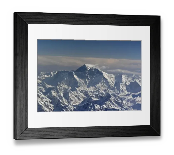 Framed Print : BHUTAN. Eternal snow on the Everest Mountain, and a small white cloud surrounding Framed Print : BHUTAN. Eternal snow on the Everest Mountain, and a small white cloud surrounding
