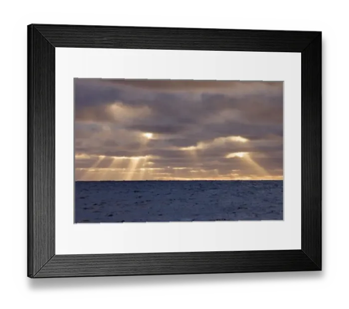 Framed Print : UK Territory, South Georgia Island, Scotia Sea. God rays pierce stormy clouds above ocean