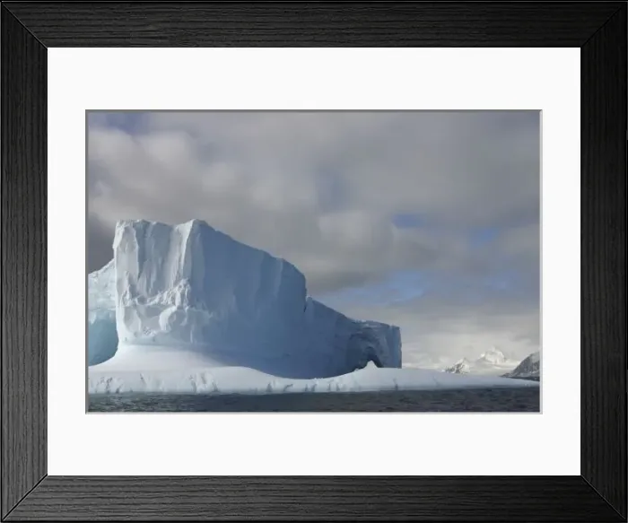 Framed Print : Antarctica, Bransfield Strait, Afternoon sun lights massive tabular iceberg near Framed Print : Antarctica, Bransfield Strait, Afternoon sun lights massive tabular iceberg near