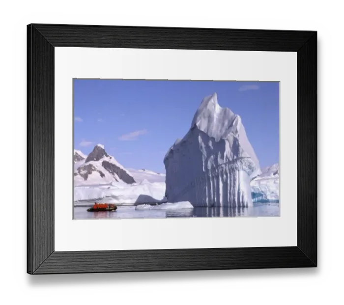 Framed Print : Antarctica, Antarctic Peninsula. Zodiak and icebergs