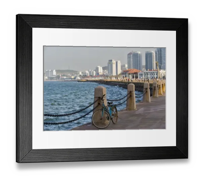 Framed Print : Bicycle at waterfront with Yantai city skyline, Shandong Province, China