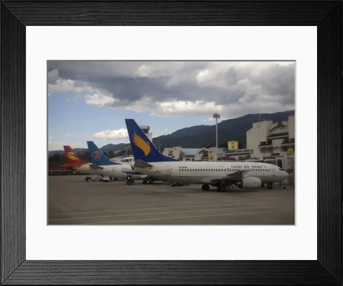 Framed Print : Domestic Chinese jet airliners lined up at departure gates at Lijiang Airport Framed Print : Domestic Chinese jet airliners lined up at departure gates at Lijiang Airport