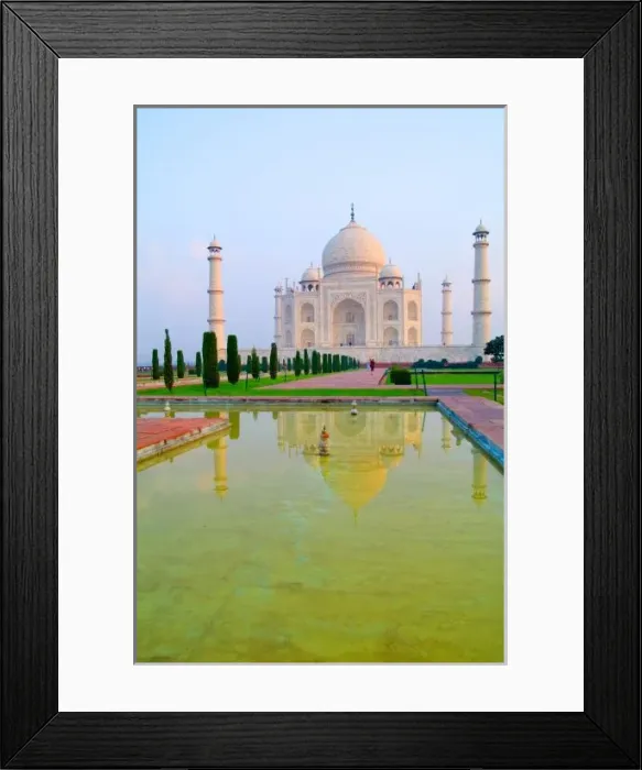 Framed Print : The quiet peaceful World Famous Taj Mahal at sunrise with reflrection one of the wonders of the world in Agra Framed Print : The quiet peaceful World Famous Taj Mahal at sunrise with reflrection one of the wonders of the world in Agra