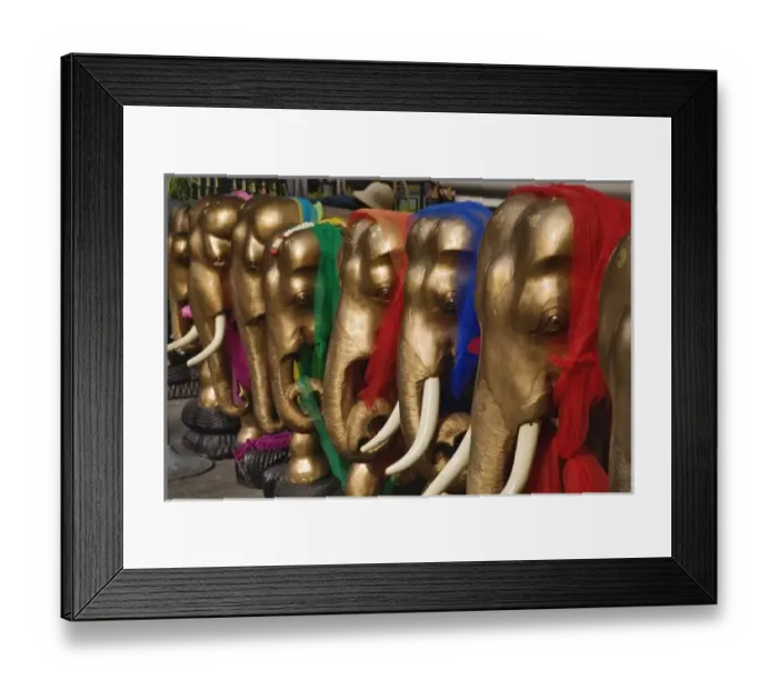 Framed Print : Golden elephants decorated with colorful scarves, Erawan Shrine, Bangkok, Thailand Framed Print : Golden elephants decorated with colorful scarves, Erawan Shrine, Bangkok, Thailand