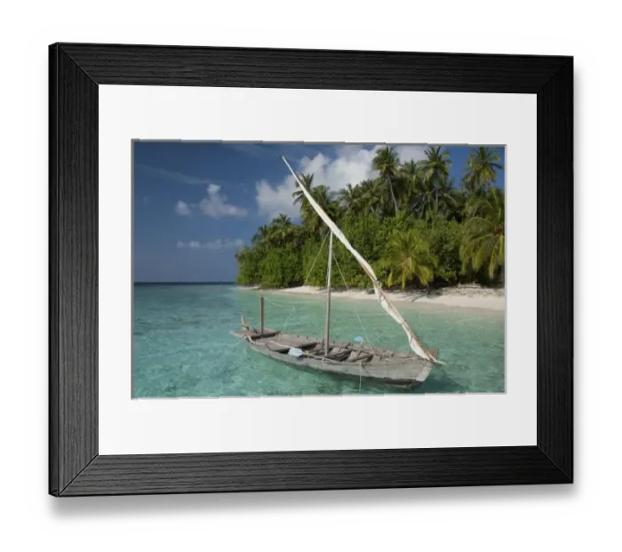Framed Print : Maldives, North Male Atoll, Island of Kuda Bandos. Traditional Maldivian boat in Framed Print : Maldives, North Male Atoll, Island of Kuda Bandos. Traditional Maldivian boat in