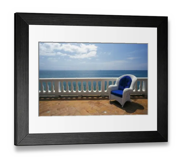 Framed Print : Puerto Rico. Wicker chair and tiled terrace at the Hornet Dorset Primavera Hotel Framed Print : Puerto Rico. Wicker chair and tiled terrace at the Hornet Dorset Primavera Hotel