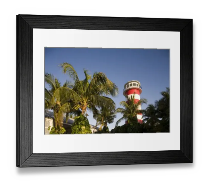 Framed Print : Bahamas, Grand Bahama Island, Freeport, Setting sun lights lighthouse exterior Framed Print : Bahamas, Grand Bahama Island, Freeport, Setting sun lights lighthouse exterior