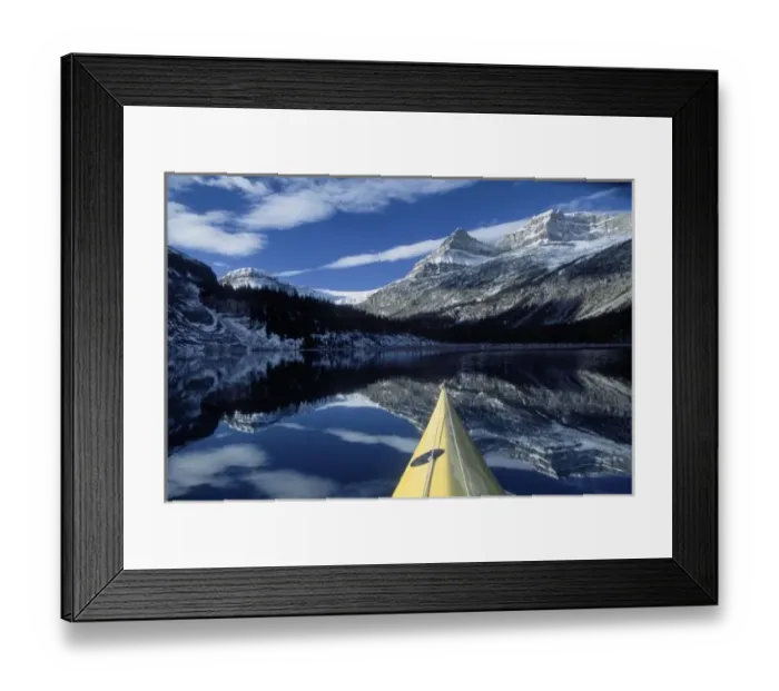 Framed Print : Canada, British Columbia, Banff. Kayak bow on calm water at Bow Lake