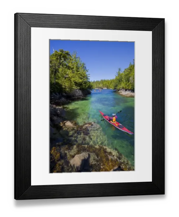 Framed Print : Canada, British Columbia, Vancouver Island. Sea kayakers in a calm channel. (MR)
