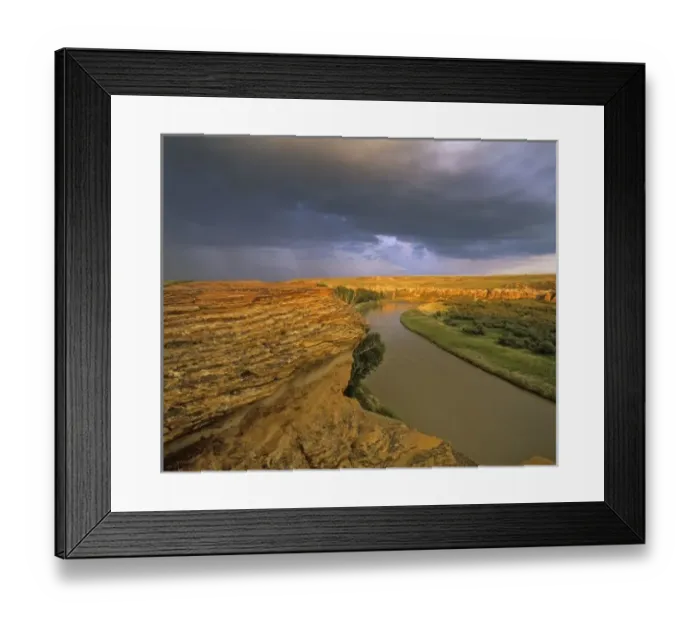 Framed Print : The Milk River runs through badlands of Writing on Stone Provincial Partk in Alberta Framed Print : The Milk River runs through badlands of Writing on Stone Provincial Partk in Alberta