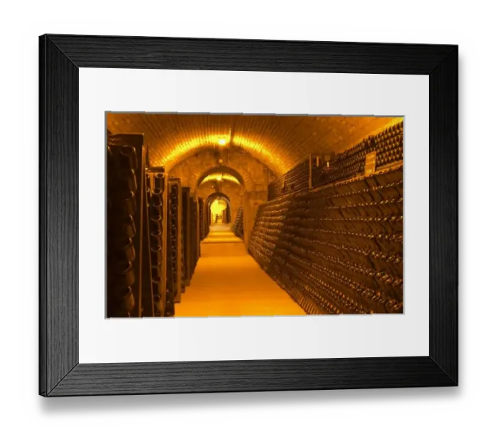 Framed Print : Bottles aging either in pupitres (racks) waiting for the secondary fermentation Framed Print : Bottles aging either in pupitres (racks) waiting for the secondary fermentation