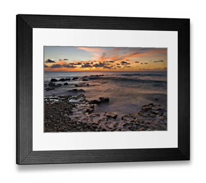 Framed Print : Caribbean Sea, Cayman Islands. Crashing waves at sunset on the shore near George Town