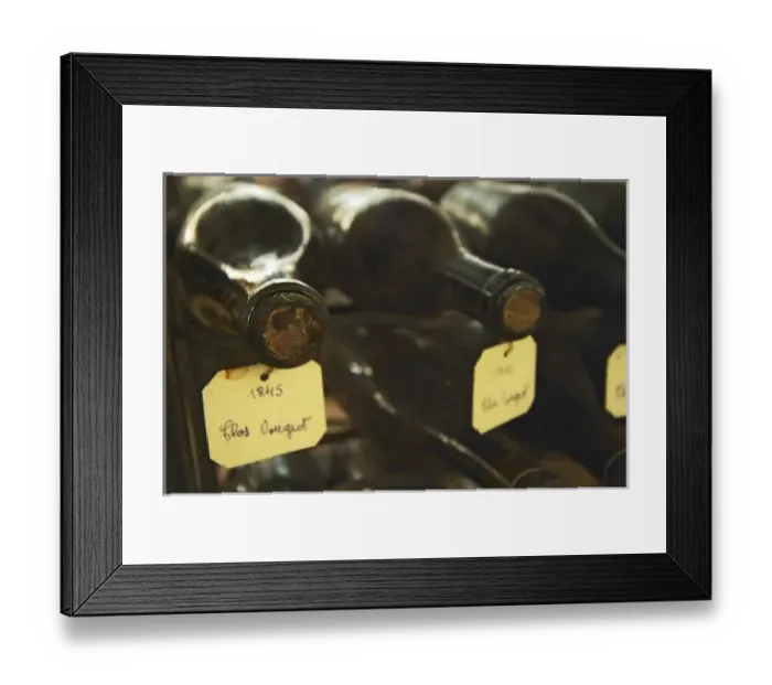 Framed Print : In the underground wine cellar: lying bottles in the treasure chamber where the oldest Framed Print : In the underground wine cellar: lying bottles in the treasure chamber where the oldest