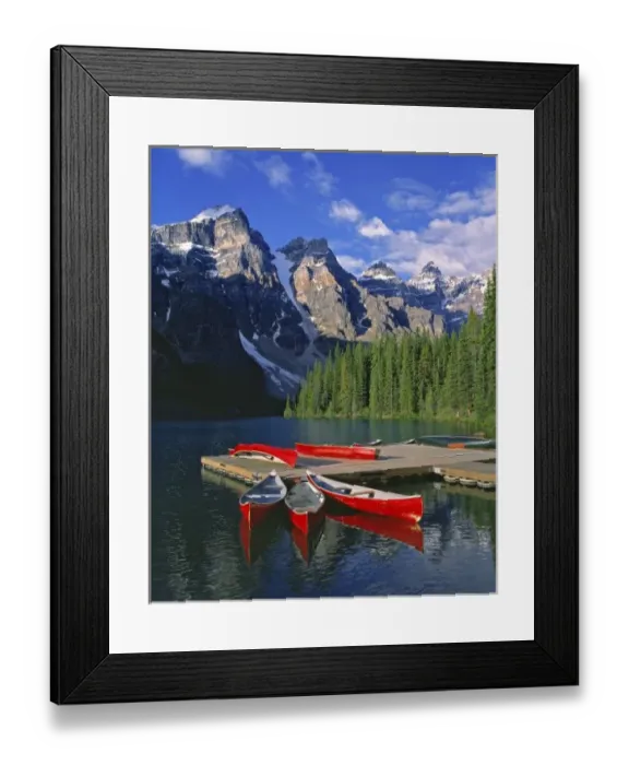 Framed Print : Canada, Alberta, Moraine Lake. Red canoes await canoers at Moraine Lake in the Valley