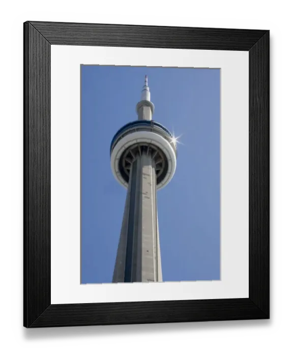 Framed Print : Canada, Ontario, Toronto. Top of CN Tower with sun star burst reflected on the top disc