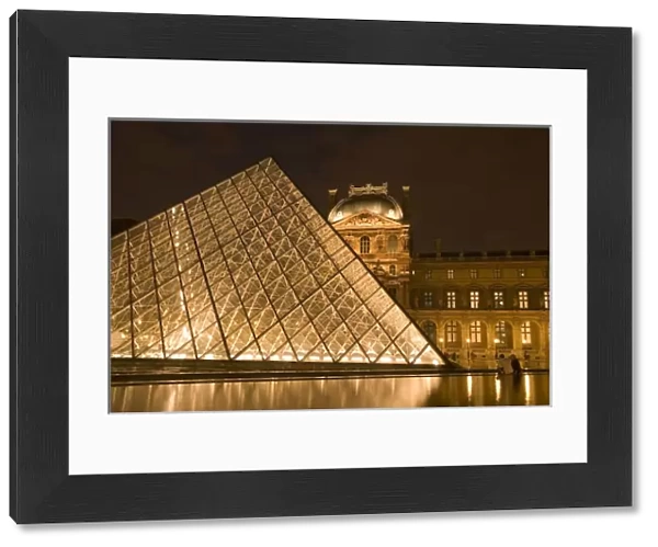 France, Paris. The Louvre at twilight. Credit as: Jim Zuckerman  /  Jaynes Gallery  /  Danita Delimont