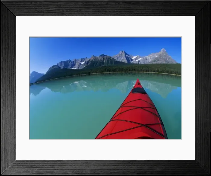 Framed Print : Kayaking on Waterfowl Lake below Howse Peak along the Icefields Parkway in Banff National Park Framed Print : Kayaking on Waterfowl Lake below Howse Peak along the Icefields Parkway in Banff National Park