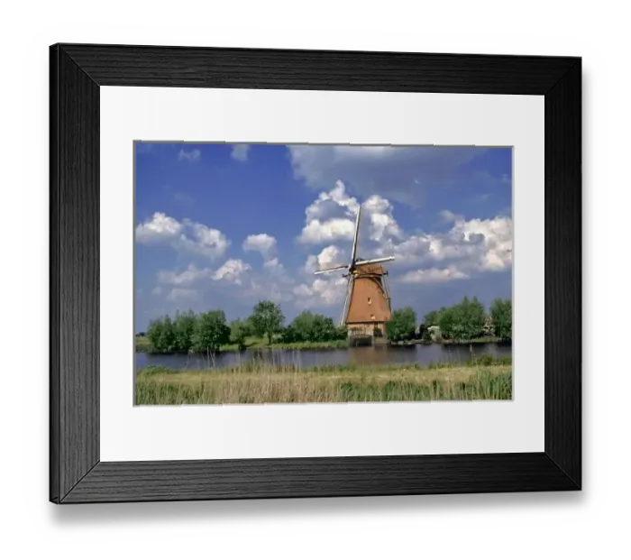 Framed Print : Europe, Netherlands, Kinerdijk. A windmill sits on the edge of the canal at Kinderdijk Framed Print : Europe, Netherlands, Kinerdijk. A windmill sits on the edge of the canal at Kinderdijk