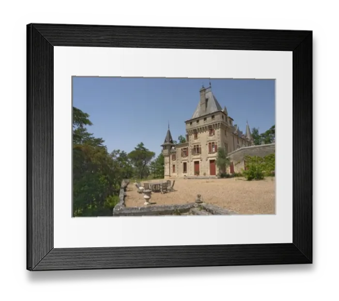 Framed Print : The magnificent Chateau de Pressac and garden furniture on the terrace Chateau de Framed Print : The magnificent Chateau de Pressac and garden furniture on the terrace Chateau de