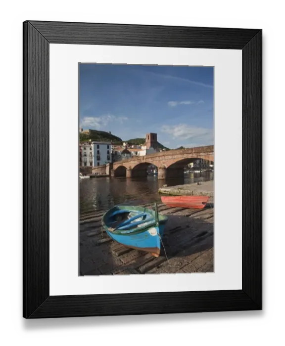Framed Print : Italy, Sardinia, Bosa. Town view along Temo River and Ponte Vecchio bridge Framed Print : Italy, Sardinia, Bosa. Town view along Temo River and Ponte Vecchio bridge