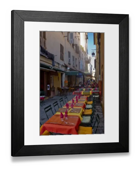 Framed Print : France, Corsica. Tables of cafe set up in narrow street in preparation for the evenings diners Framed Print : France, Corsica. Tables of cafe set up in narrow street in preparation for the evenings diners