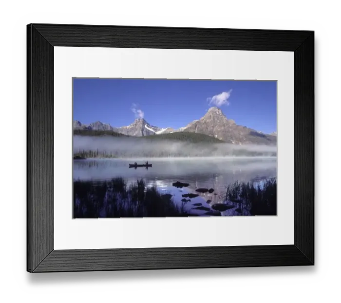 Framed Print : Fishermen in canoe on Waterfowl Lake, Banff National Park, Canada Framed Print : Fishermen in canoe on Waterfowl Lake, Banff National Park, Canada