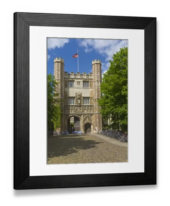 Framed Print : Gate to Trinity College and rows of bicycles, Cambridge, England
