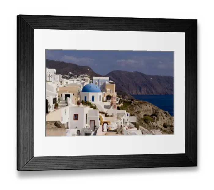 Framed Print : Beautiful village of Oia with white buildings looking down into the water, Santorini Framed Print : Beautiful village of Oia with white buildings looking down into the water, Santorini