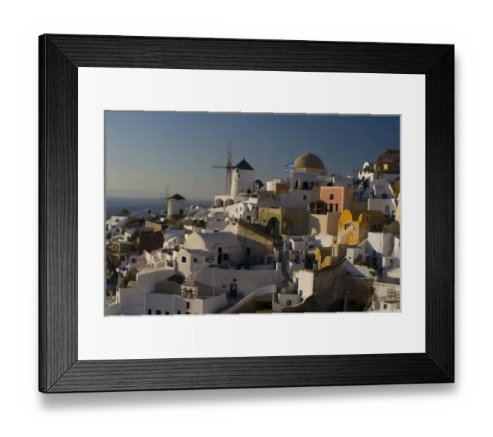 Framed Print : Greece and Greek Island of Santorini town of Oia in evening light with the many homes Framed Print : Greece and Greek Island of Santorini town of Oia in evening light with the many homes