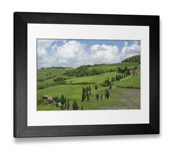 Framed Print : Italy, Tuscany. La Foce. A curved road winds up the hillside past hay fields Framed Print : Italy, Tuscany. La Foce. A curved road winds up the hillside past hay fields