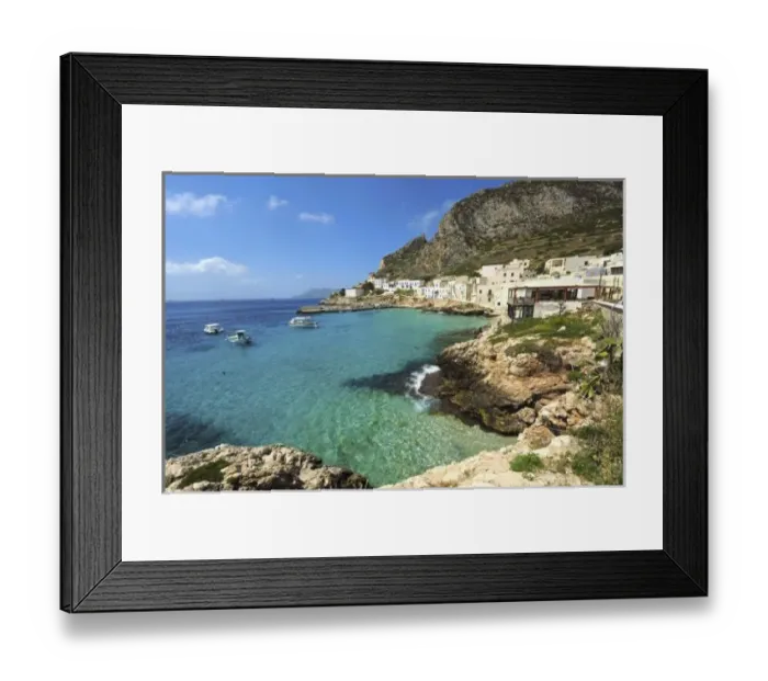 Framed Print : Italy, Sicily, Egadi Islands, Levanzo, transparent blue sea in front of little village Framed Print : Italy, Sicily, Egadi Islands, Levanzo, transparent blue sea in front of little village