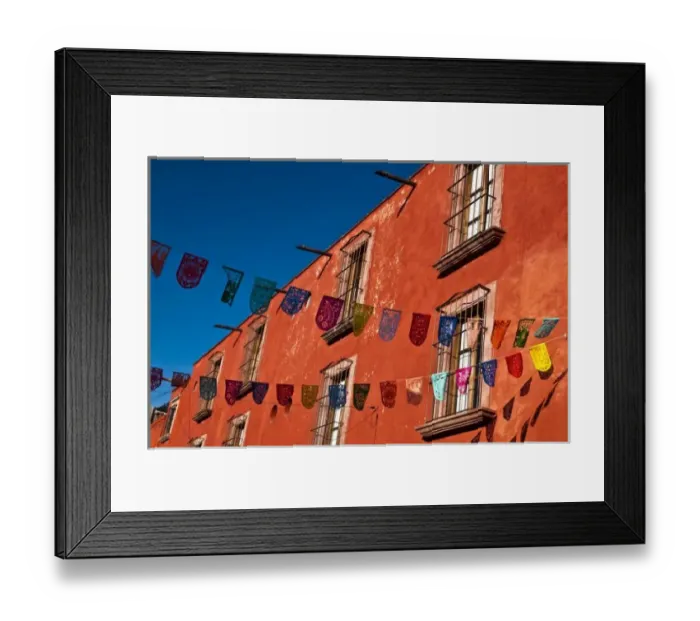 Framed Print : Mexico, San Miguel de Allende. Colorful banners strung across street Framed Print : Mexico, San Miguel de Allende. Colorful banners strung across street