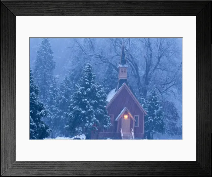 Framed Print : Historic Yosemite Valley Chapel during heavy snowfall in Yosemite National Park, California