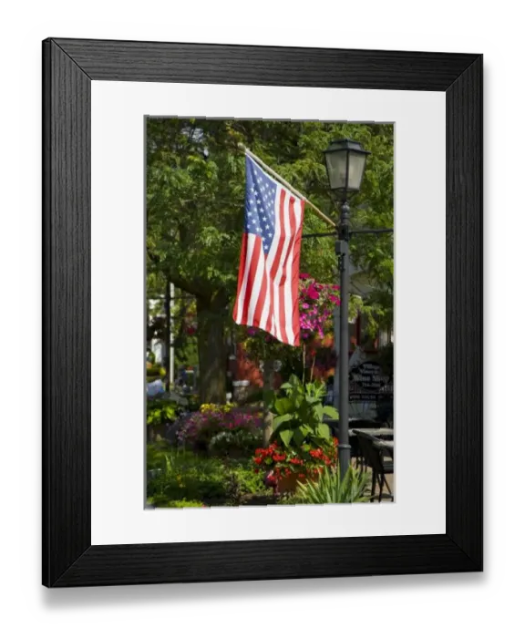 Framed Print : USA, New York, Lewiston. American flag attached to lamp post near wine shopFred J Framed Print : USA, New York, Lewiston. American flag attached to lamp post near wine shopFred J