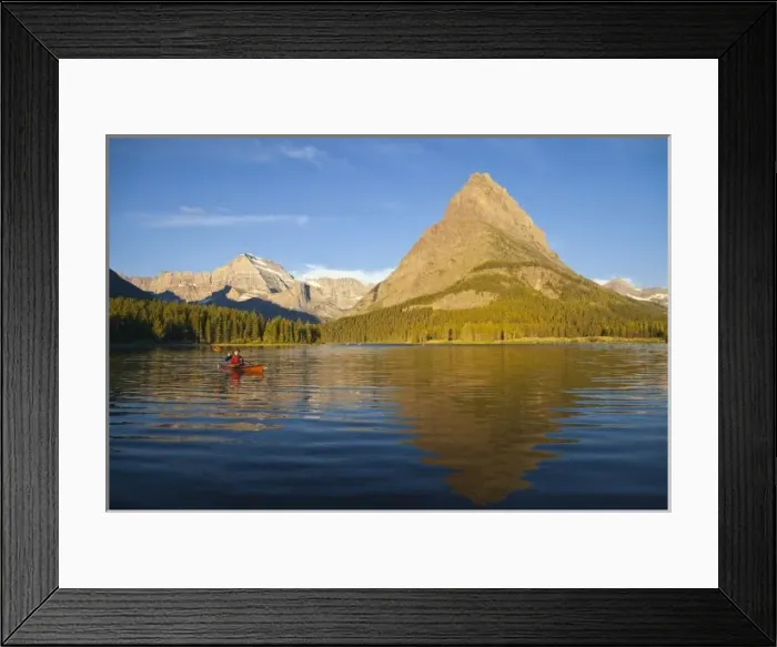 Framed Print : Kayaking in Swiftcurrent Lake at sunrise in the Many Glacier Valley of Glacier National Park Framed Print : Kayaking in Swiftcurrent Lake at sunrise in the Many Glacier Valley of Glacier National Park