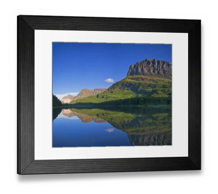 Framed Print : Grinnel Point and Allen Mountain reflect into Fishercap Lake in the Many Glacier Framed Print : Grinnel Point and Allen Mountain reflect into Fishercap Lake in the Many Glacier