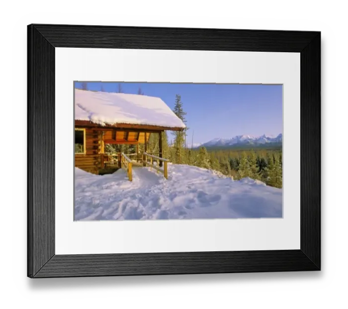 Framed Print : USFS Schnauss Cabin rental in Winter ovelooking peaks in Glacier National Park in winter