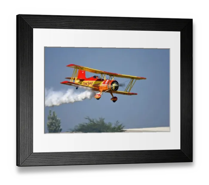 Framed Print : Gene Soucy performing aerobatics in Grumman Biplane Showcat, Oshkosh 2006