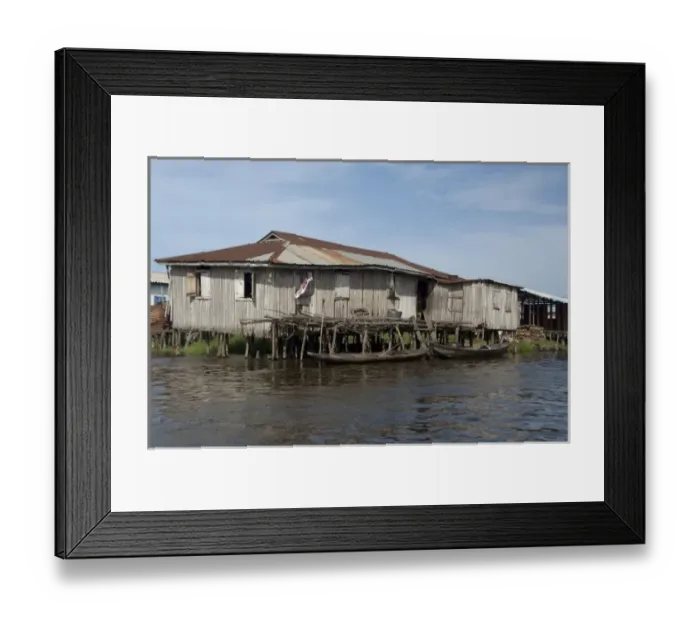 Framed Print : Africa, Benin, Ganvie. typical Tofinu village home on stilts over the waters of Lake Nokoue