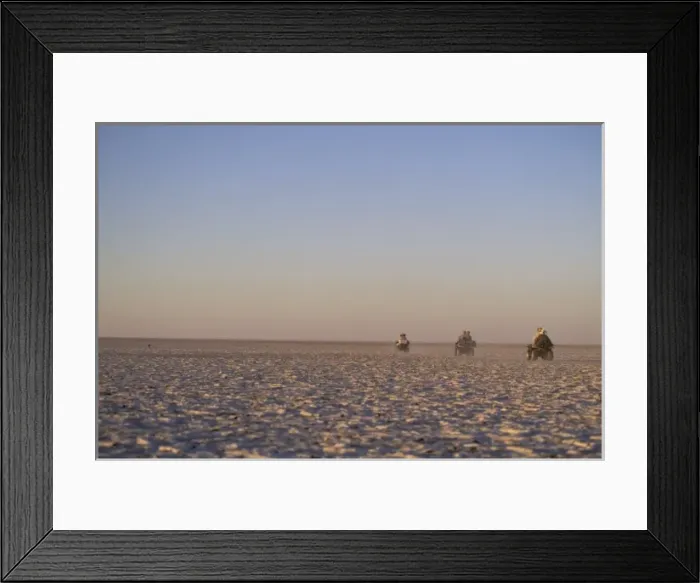 Framed Print : Africa, Botswana, Makgadikgadi Pans. ATVs in desert