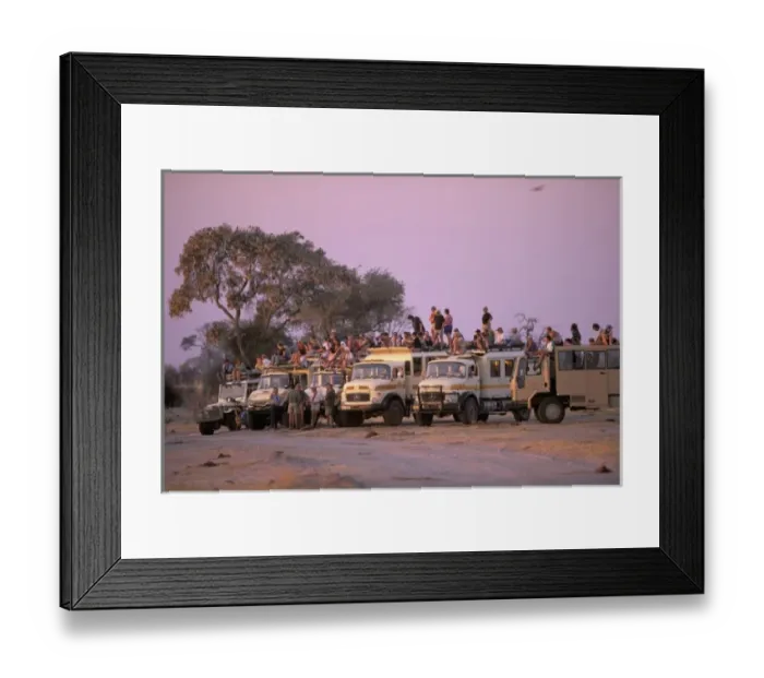 Framed Print : Africa, Botswana, Savuti. Overland vehicles at waterhole Framed Print : Africa, Botswana, Savuti. Overland vehicles at waterhole