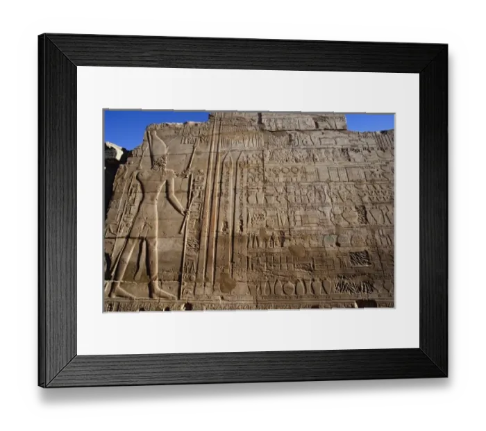 Framed Print : Ancient hieroglyphs on wall, Temple of Karnak, located at modern day Luxor or ancient Thebes Framed Print : Ancient hieroglyphs on wall, Temple of Karnak, located at modern day Luxor or ancient Thebes