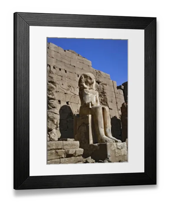 Framed Print : Pharaoh statue at entrance to Temple of Karnak, located at modern day Luxor or ancient Thebes